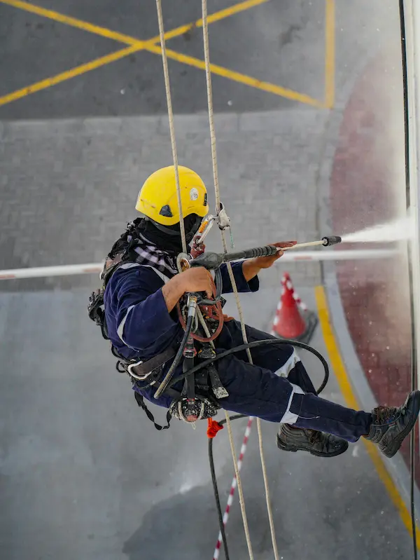 Industrial climbers working together at height
